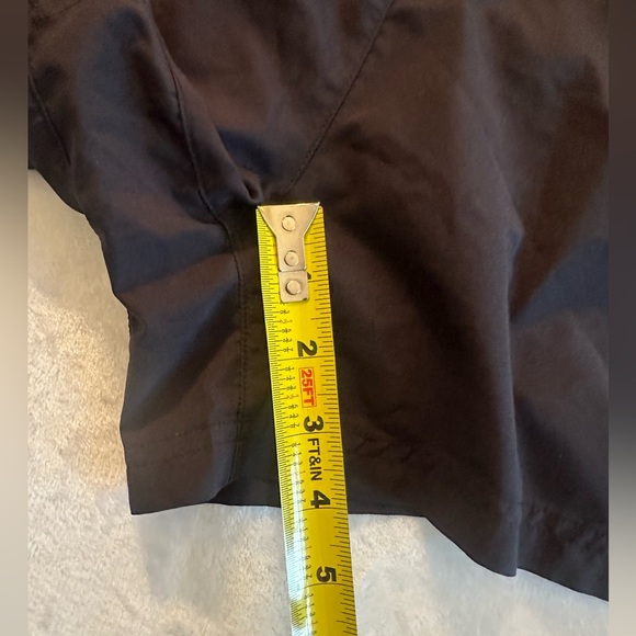 Adidas women’s medium running shorts. Black with 3 stripe in blue. EUC - Picture 6 of 7